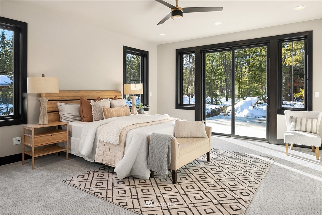 651 Bakers Road Ronald, WA 98940 - Photo 15 of 39 a bedroom with a large bed and a large window