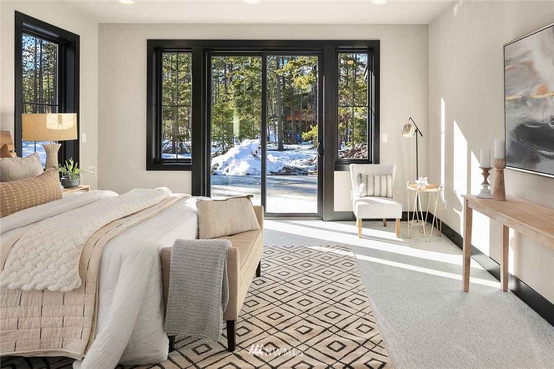 651 Bakers Road Ronald, WA 98940 - Photo 16 of 39 a bedroom with a bed couch and a large window