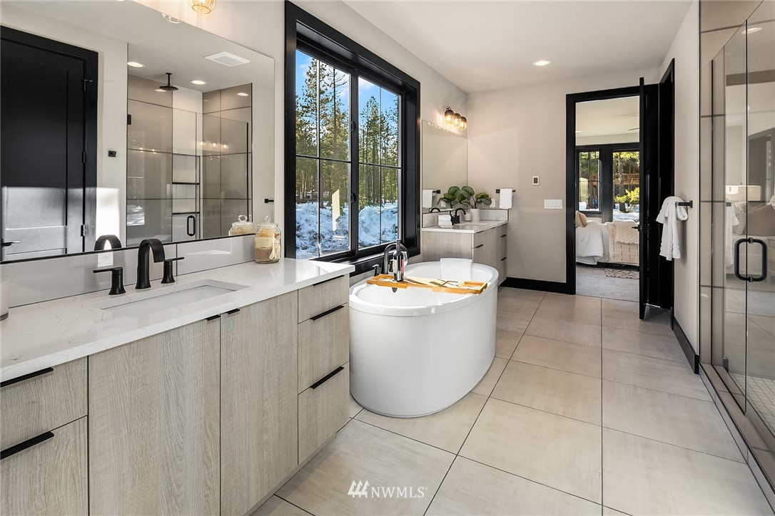 651 Bakers Road Ronald, WA 98940 - Photo 17 of 39 a view of a bathroom with a bathtub and sink