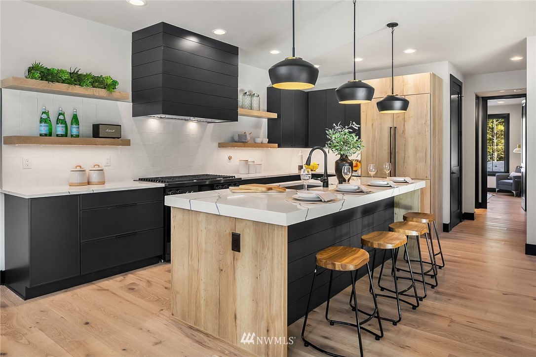 651 Bakers Road Ronald, WA 98940 - Photo 9 of 39 a kitchen with stainless steel appliances kitchen island granite countertop a stove a sink and a refrigerator