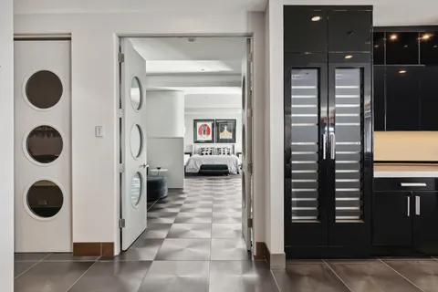 a bathroom with a shower and a mirror