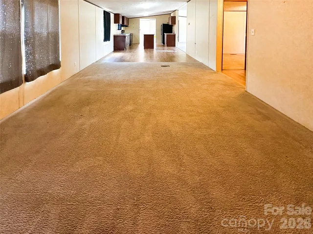 a view of a large pool with an ocean view