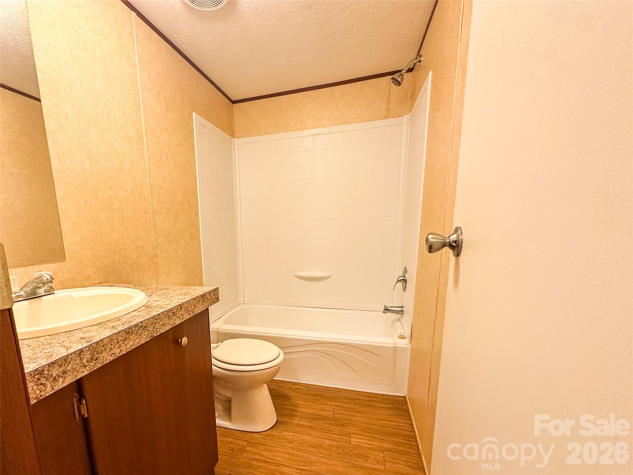 356 Brooks Road Bostic, NC 28018 - Photo 15 of 22 a bathroom with a granite countertop sink toilet and shower