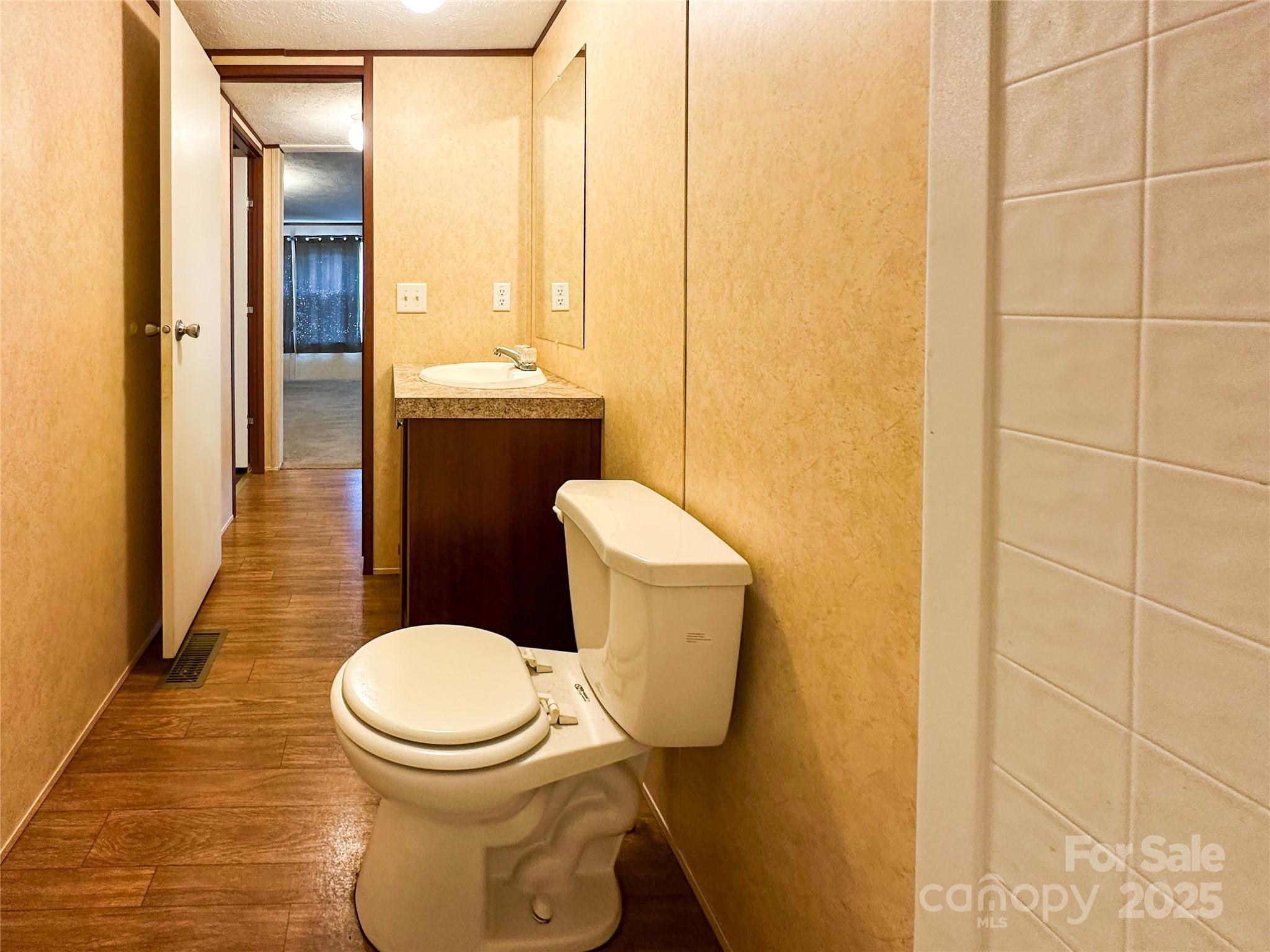356 Brooks Road Bostic, NC 28018 - Photo 16 of 23 a bathroom with a toilet and a sink