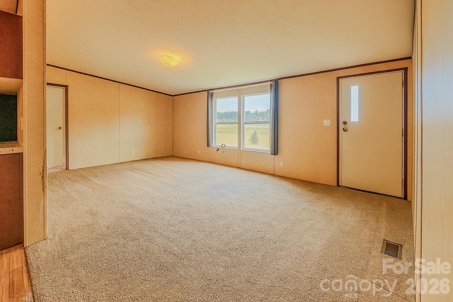 356 Brooks Road Bostic, NC 28018 - Photo 18 of 22 a view of an empty room with a window