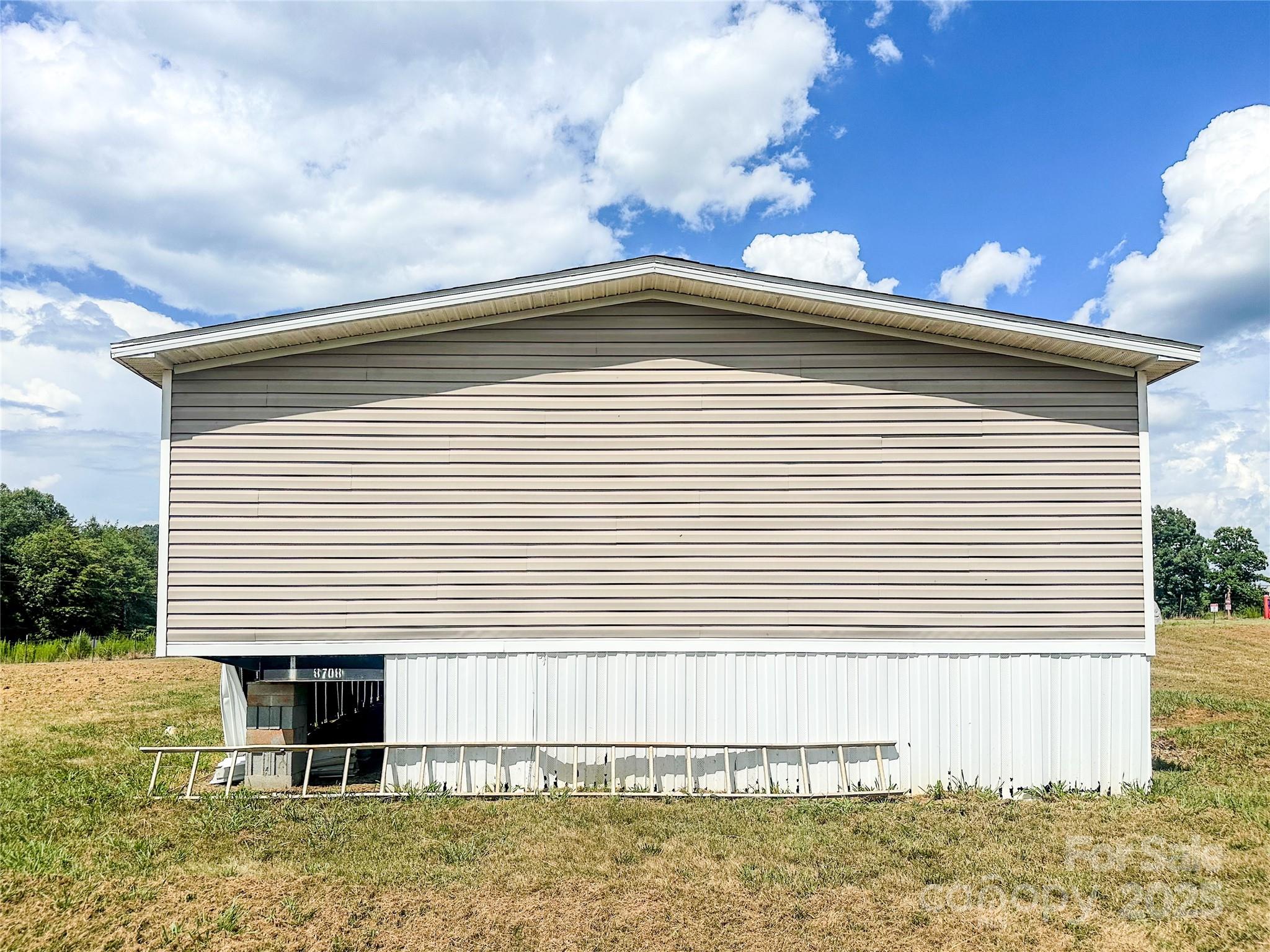 356 Brooks Road Bostic, NC 28018 - Photo 4 of 23 a front view of a house with a balcony