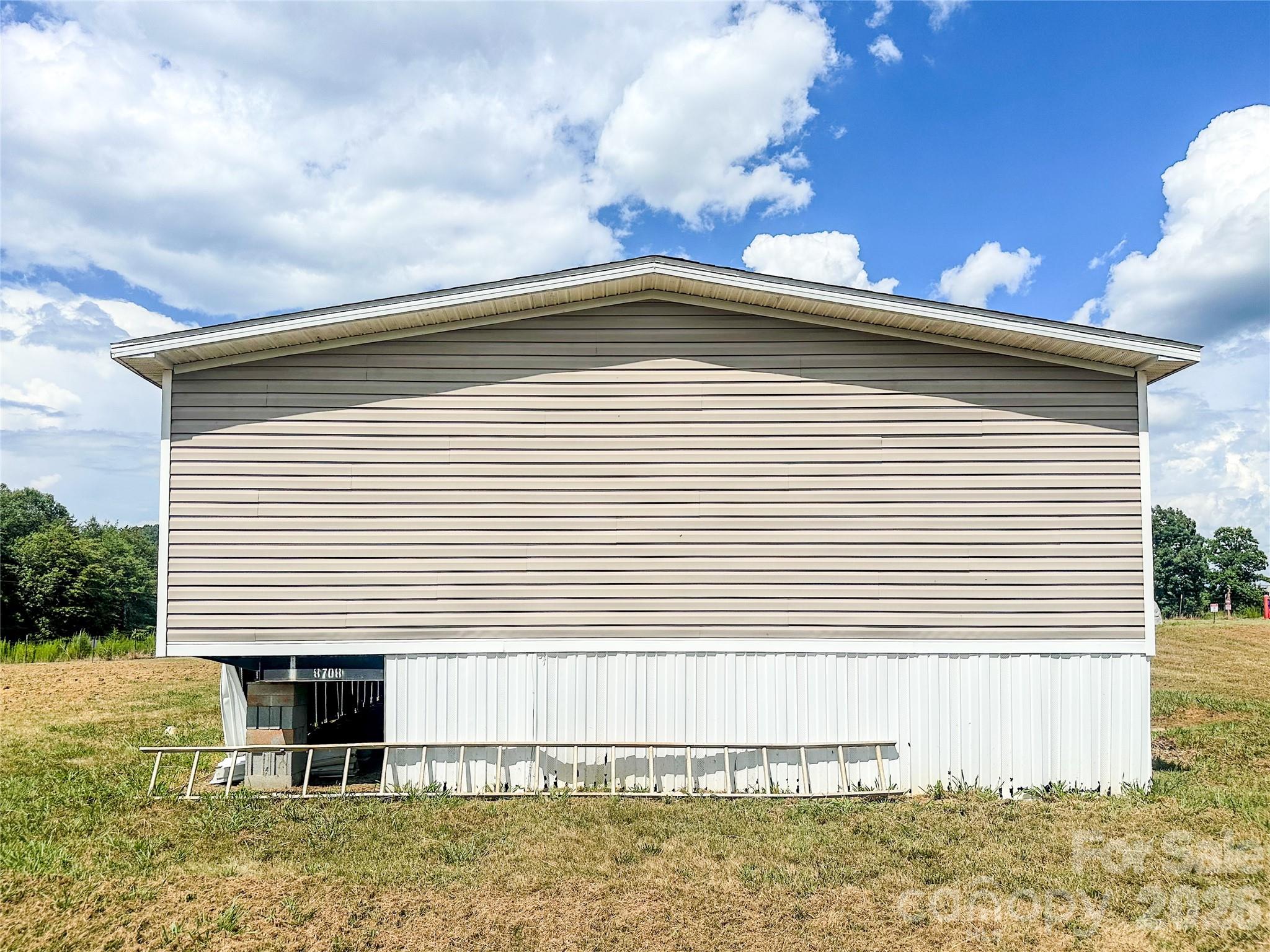 356 Brooks Road Bostic, NC 28018 - Photo 4 of 22 a front view of a house with a yard