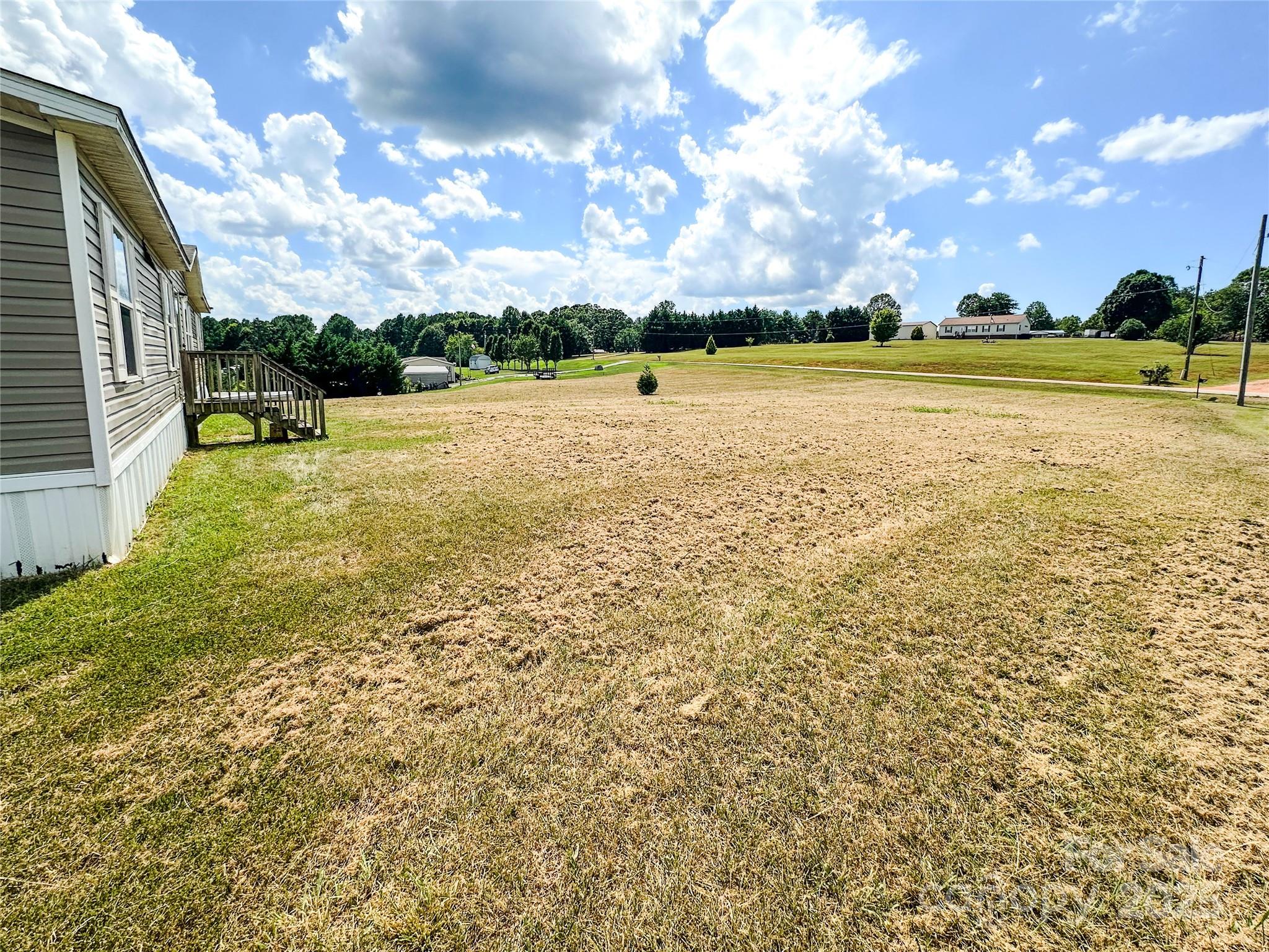 356 Brooks Road Bostic, NC 28018 - Photo 6 of 23 a view of a lake with houses in back
