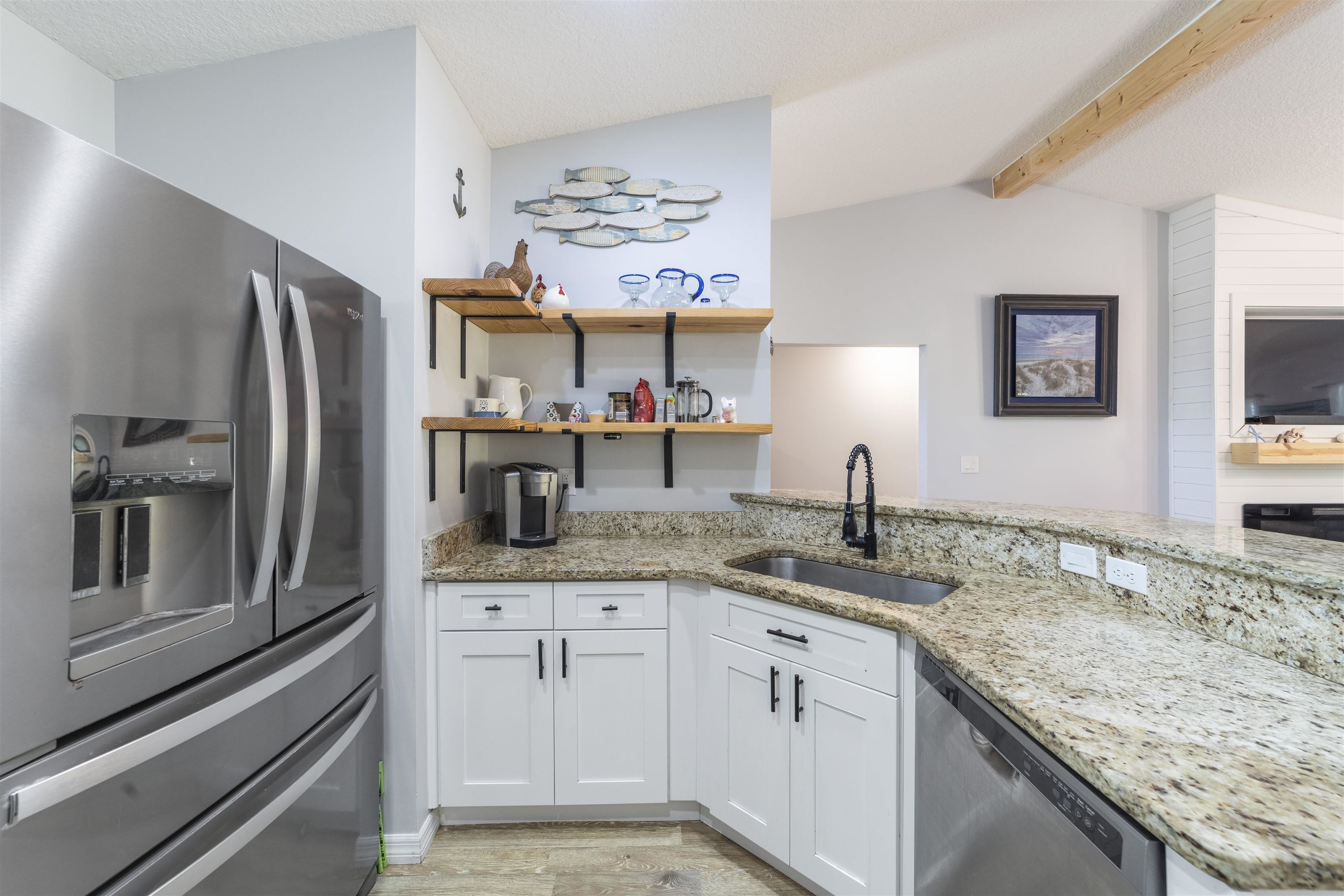 101 Azalea Road St. Augustine, FL 32086 - Photo 15 of 35 a kitchen with stainless steel appliances granite countertop a sink refrigerator and microwave