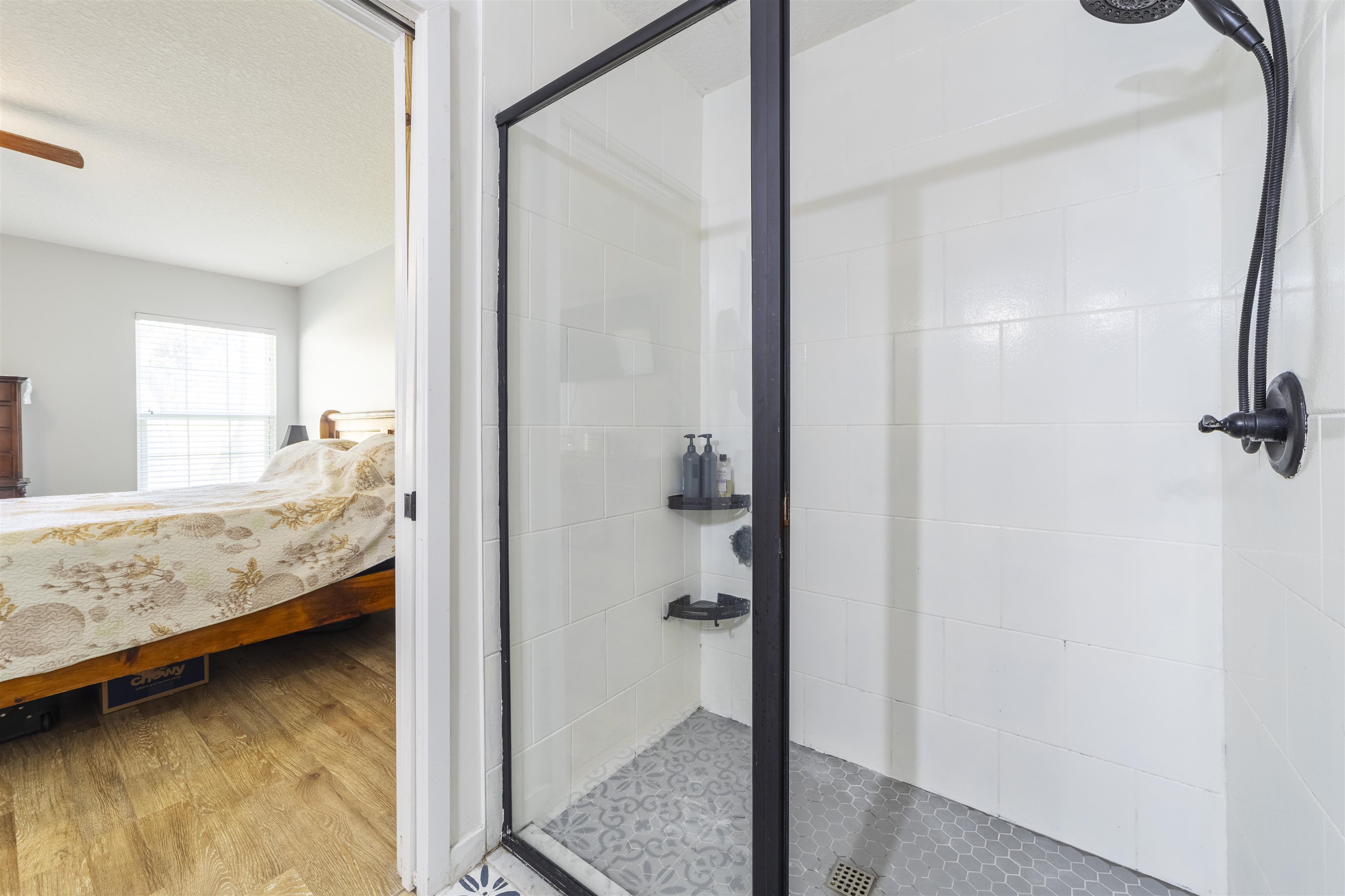 101 Azalea Road St. Augustine, FL 32086 - Photo 20 of 35 a bathroom with a tub and shower