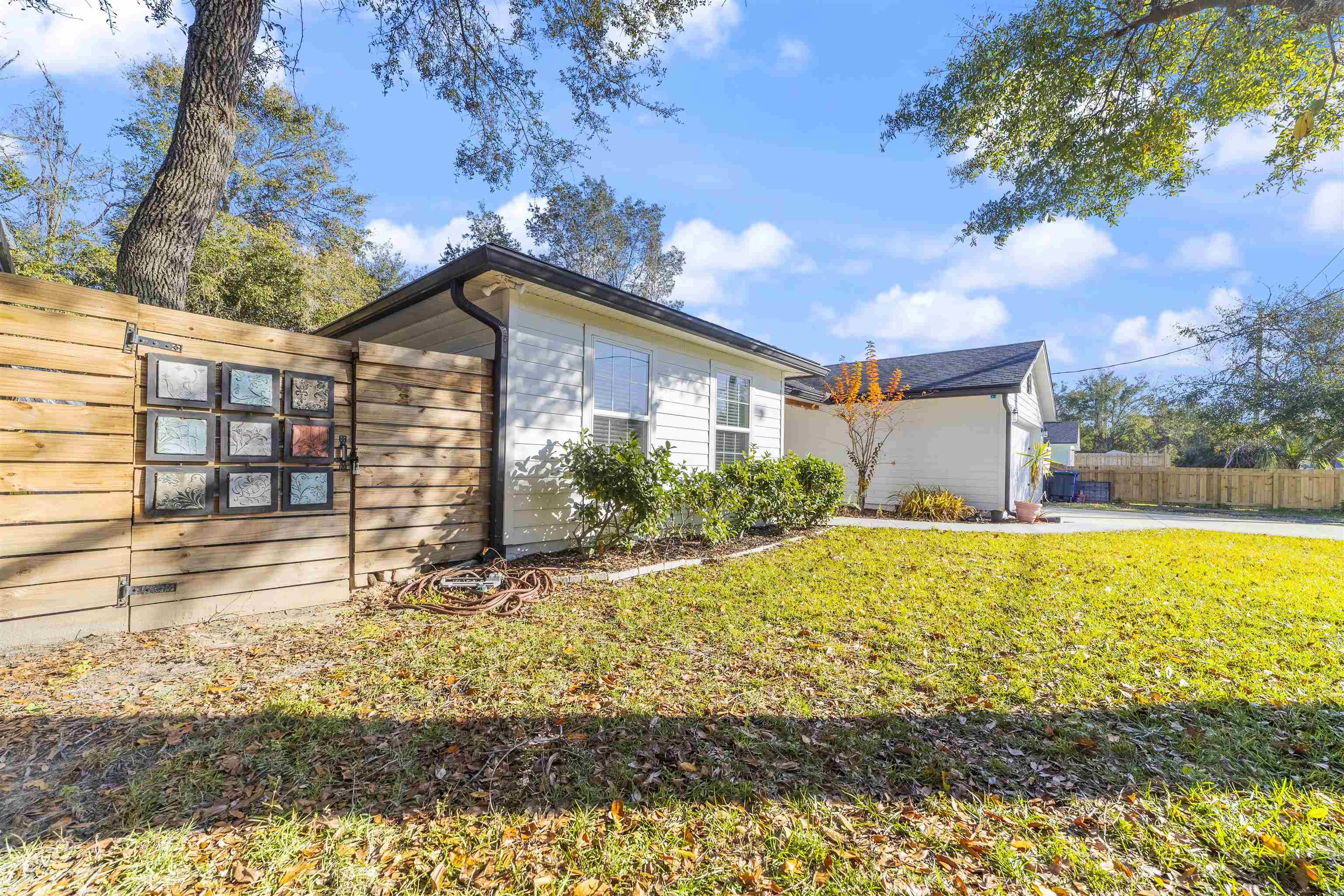 101 Azalea Road St. Augustine, FL 32086 - Photo 3 of 35 a view of a house with a yard