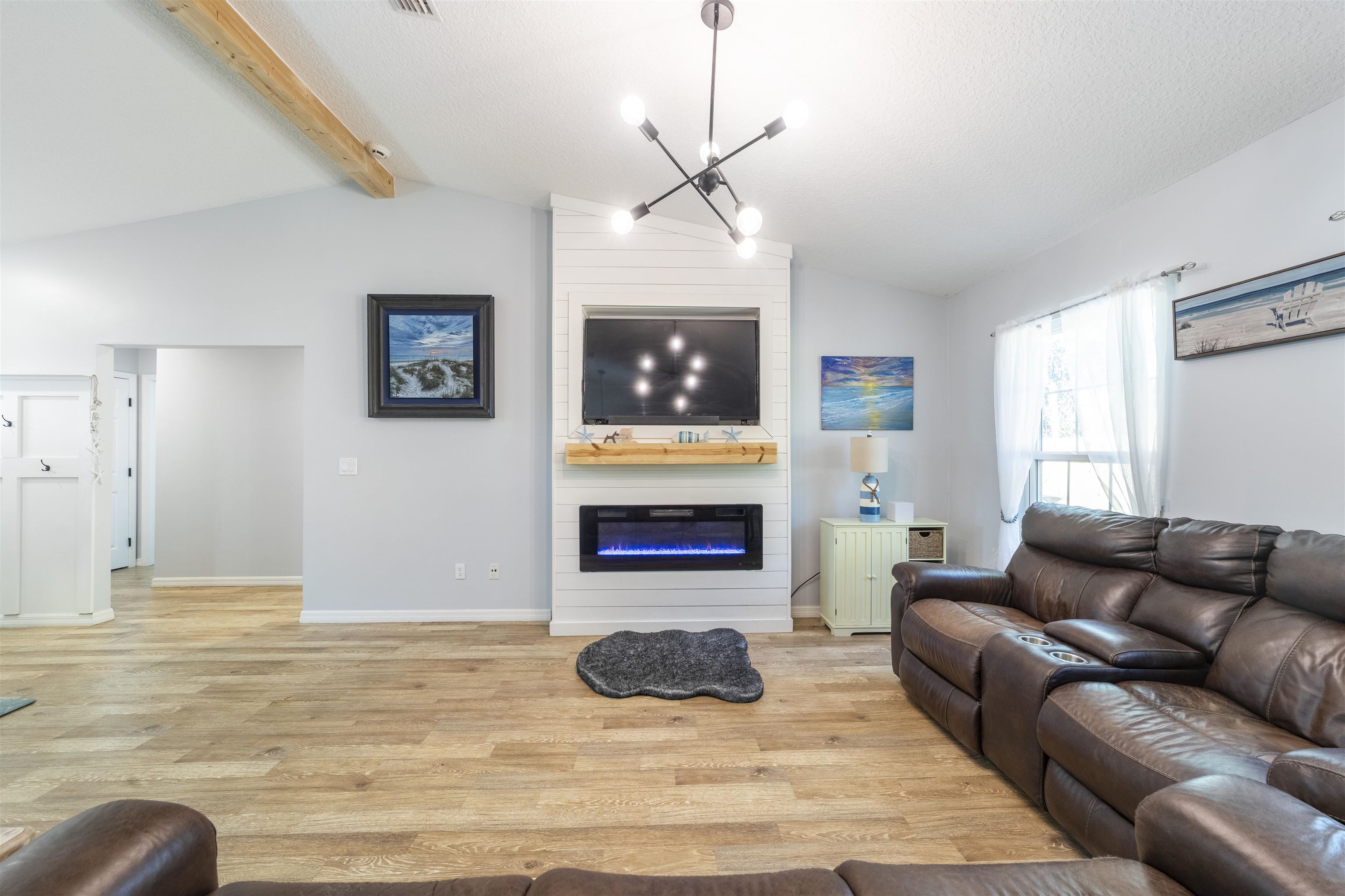 101 Azalea Road St. Augustine, FL 32086 - Photo 8 of 35 a living room with furniture and a fireplace