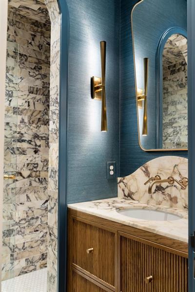 1026 Reeder Circle Northeast Atlanta, GA 30306 - Photo 15 of 95 a bathroom with a sink and a mirror