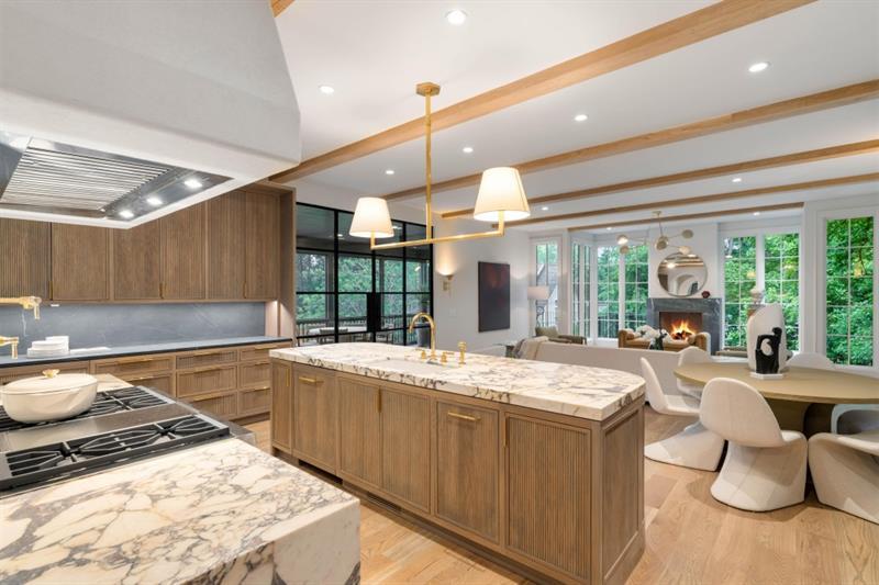 1026 Reeder Circle Northeast Atlanta, GA 30306 - Photo 28 of 95 a kitchen with a stove a sink and a dining table