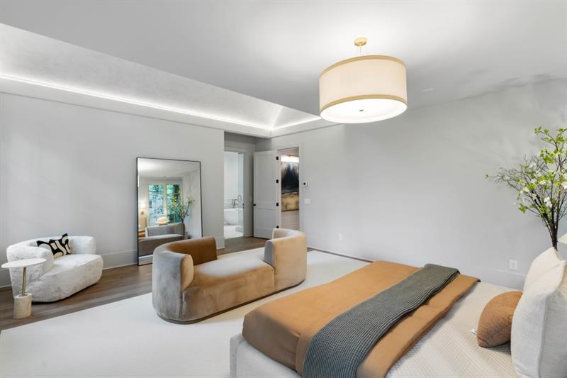 1026 Reeder Circle Northeast Atlanta, GA 30306 - Photo 33 of 95 a bedroom with bed and a potted plant