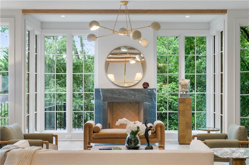 1026 Reeder Circle Northeast Atlanta, GA 30306 - Photo 4 of 95 a living room with furniture a fireplace and a large window