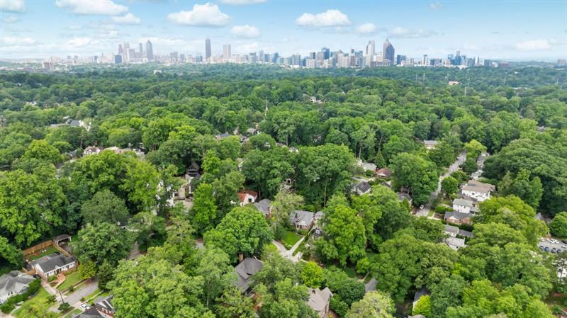1026 Reeder Circle Northeast Atlanta, GA 30306 - Photo 70 of 95 a view of a green field with lots of bushes