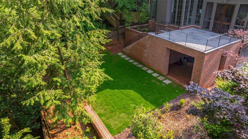 1026 Reeder Circle Northeast Atlanta, GA 30306 - Photo 76 of 95 a backyard of a house with lots of green space