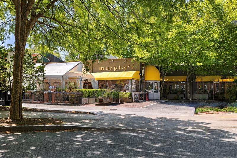 1026 Reeder Circle Northeast Atlanta, GA 30306 - Photo 83 of 95 a front view of a house with a yard and potted plants