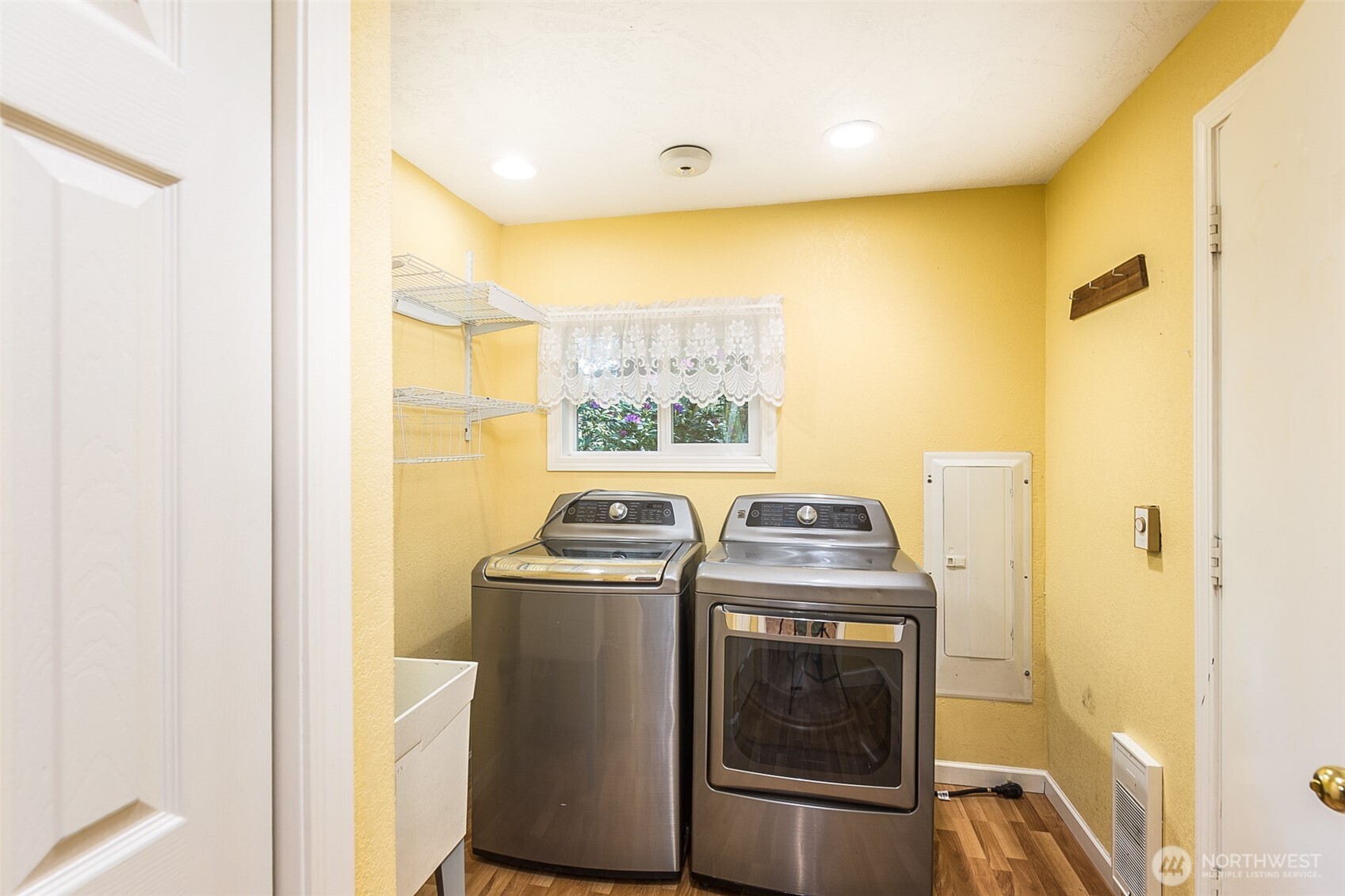 123 Forest Ridge Drive Sequim, WA 98382 - Photo 30 of 32 a utility room with dryer and washer