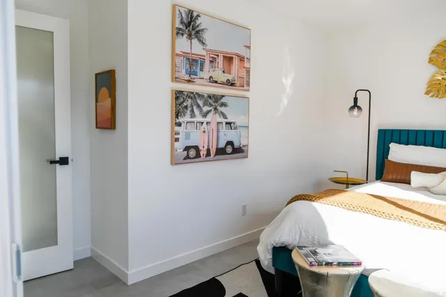 a view of a dining room with furniture and a garden