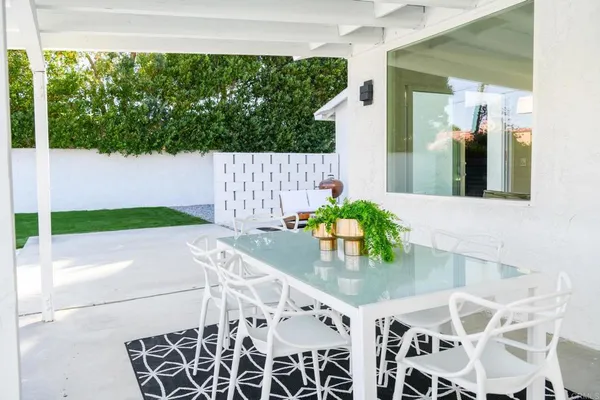 a view of a house with swimming pool