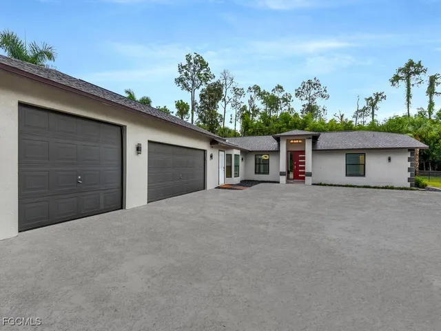 front view of a house with a garage