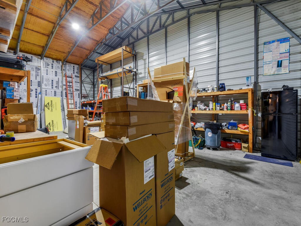 11981 Plantation Road Fort Myers, FL 33966 - Photo 44 of 48 a view of storage and utility room