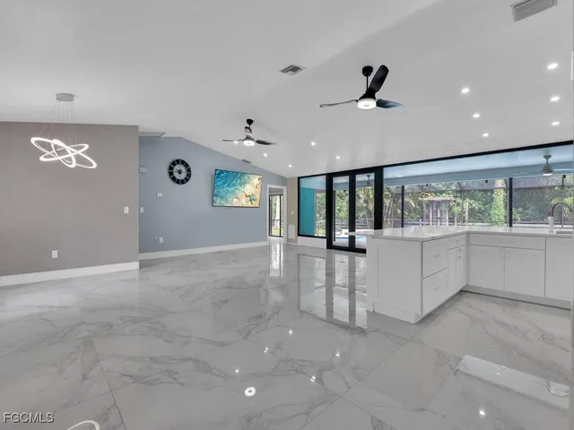 a view of an empty room with window