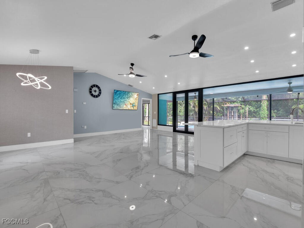 11981 Plantation Road Fort Myers, FL 33966 - Photo 9 of 48 a view of an empty room with window