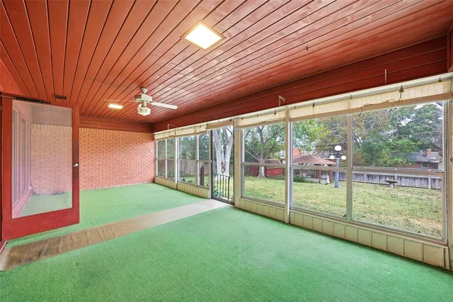 a view of a backyard with garden