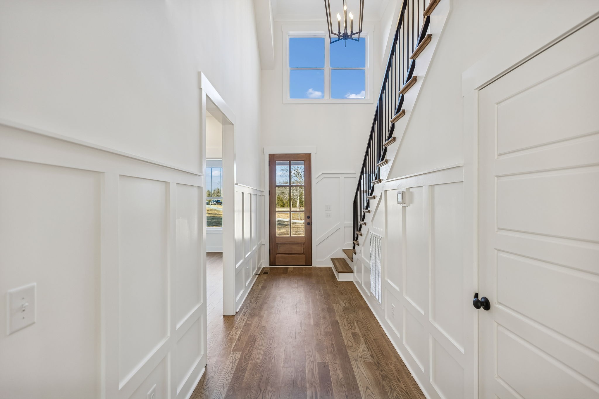 13841 Cainsville Road Lebanon, TN 37090 - Photo 13 of 81 a view of a hallway with wooden floor and staircase