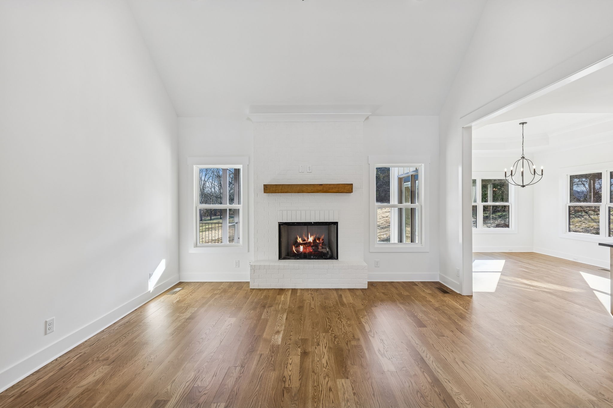 13841 Cainsville Road Lebanon, TN 37090 - Photo 15 of 81 a view of an empty room with window and wooden floor