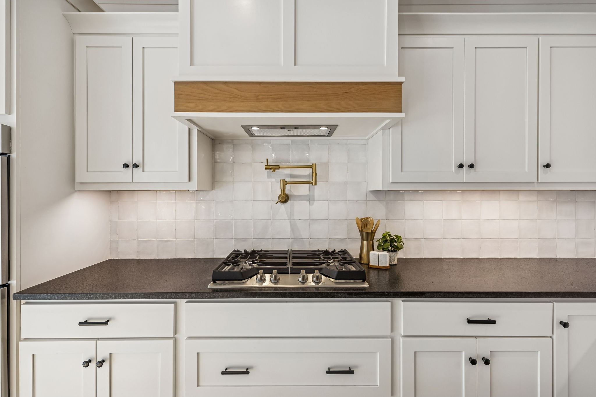 13841 Cainsville Road Lebanon, TN 37090 - Photo 23 of 81 a kitchen with white cabinets and appliances