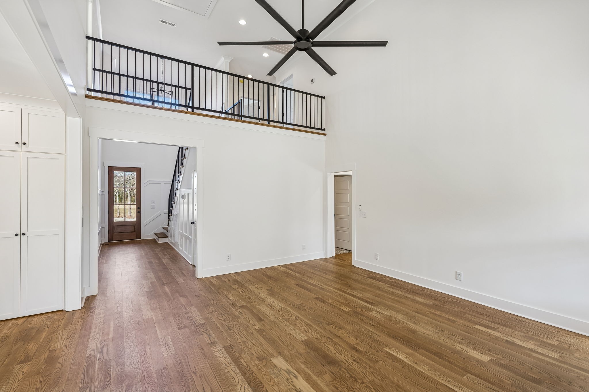 13841 Cainsville Road Lebanon, TN 37090 - Photo 27 of 81 a view of a hallway with wooden floor and staircase