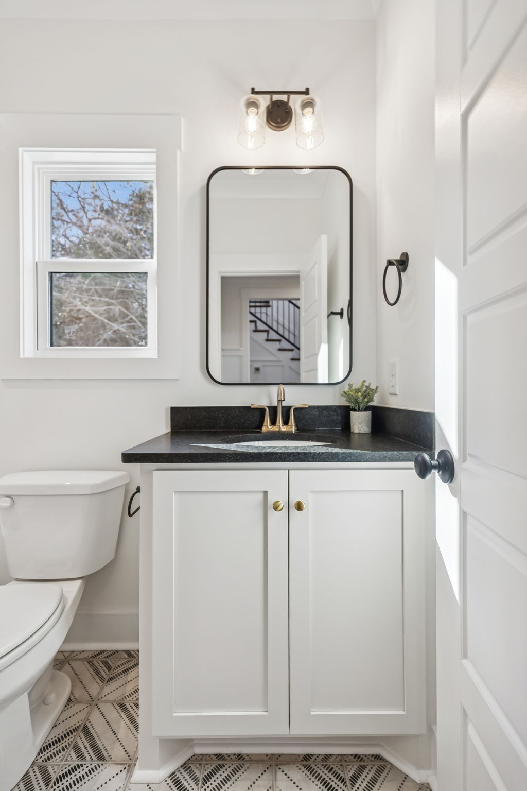 13841 Cainsville Road Lebanon, TN 37090 - Photo 29 of 81 a bathroom with a toilet a sink and a mirror