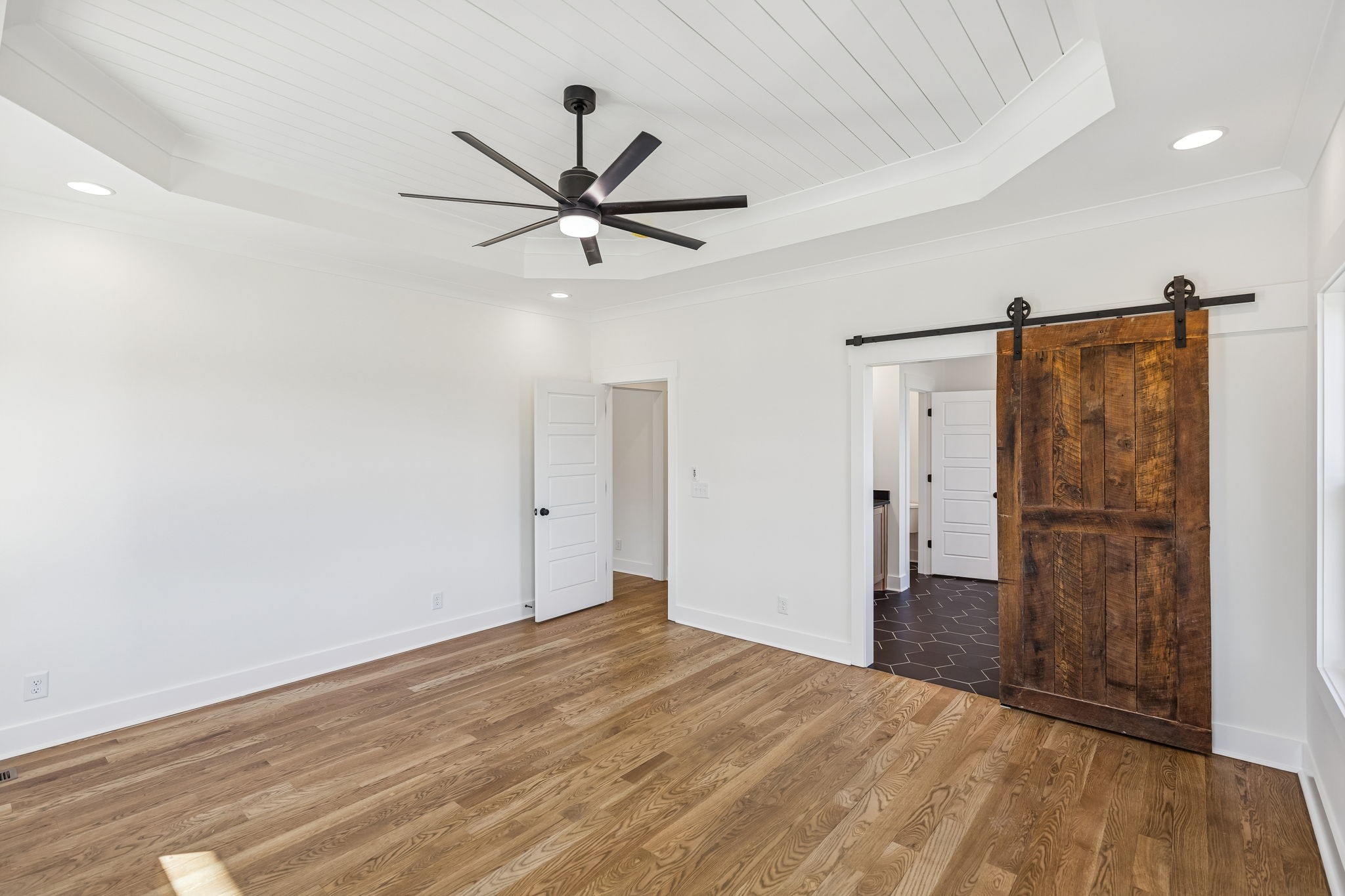 13841 Cainsville Road Lebanon, TN 37090 - Photo 30 of 81 a view of a big room with wooden floor and a ceiling fan