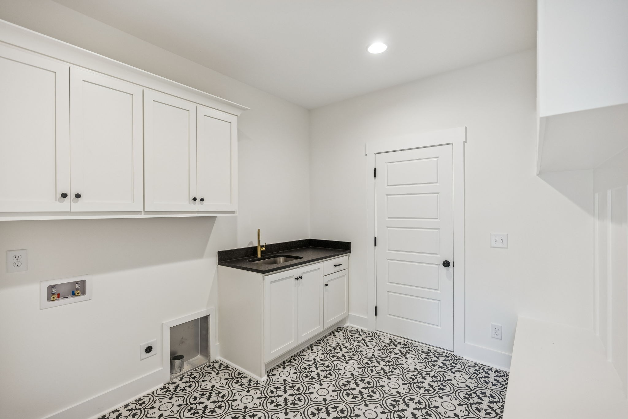 13841 Cainsville Road Lebanon, TN 37090 - Photo 40 of 81 a kitchen with granite countertop white cabinets and white appliances