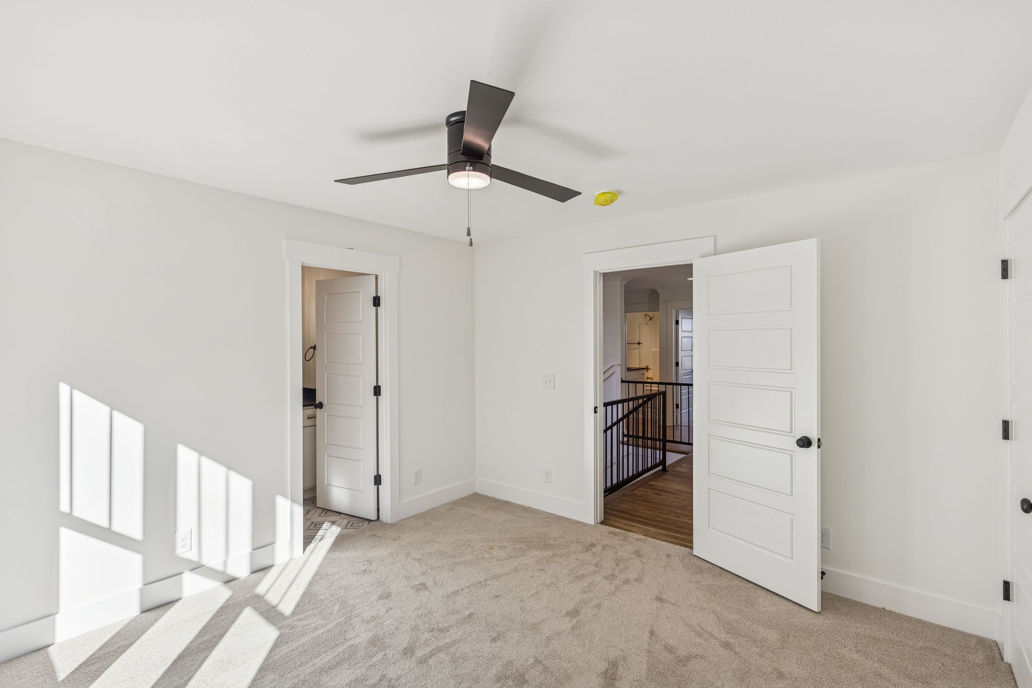 13841 Cainsville Road Lebanon, TN 37090 - Photo 44 of 81 a view of a livingroom with a chandelier fan and wooden floor