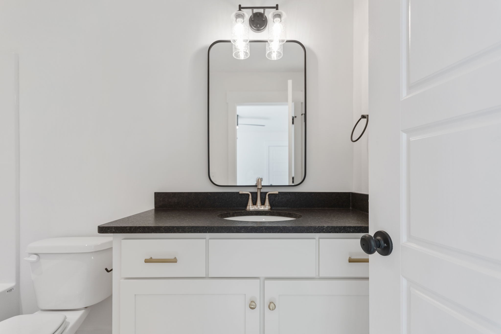 13841 Cainsville Road Lebanon, TN 37090 - Photo 47 of 81 a close view of a sink and a mirror in a bathroom