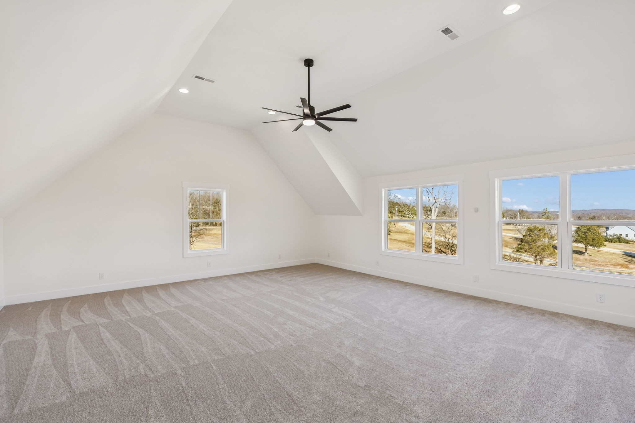 13841 Cainsville Road Lebanon, TN 37090 - Photo 49 of 81 an empty room with windows and ceiling fan
