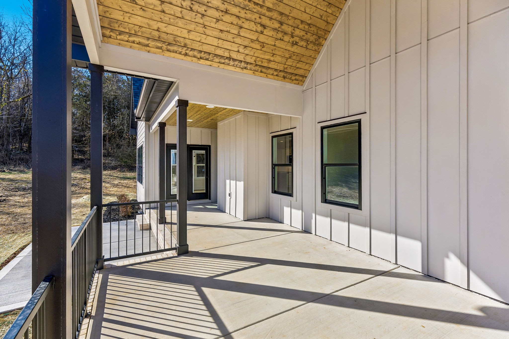 13841 Cainsville Road Lebanon, TN 37090 - Photo 53 of 81 a view of a porch with a table and chairs