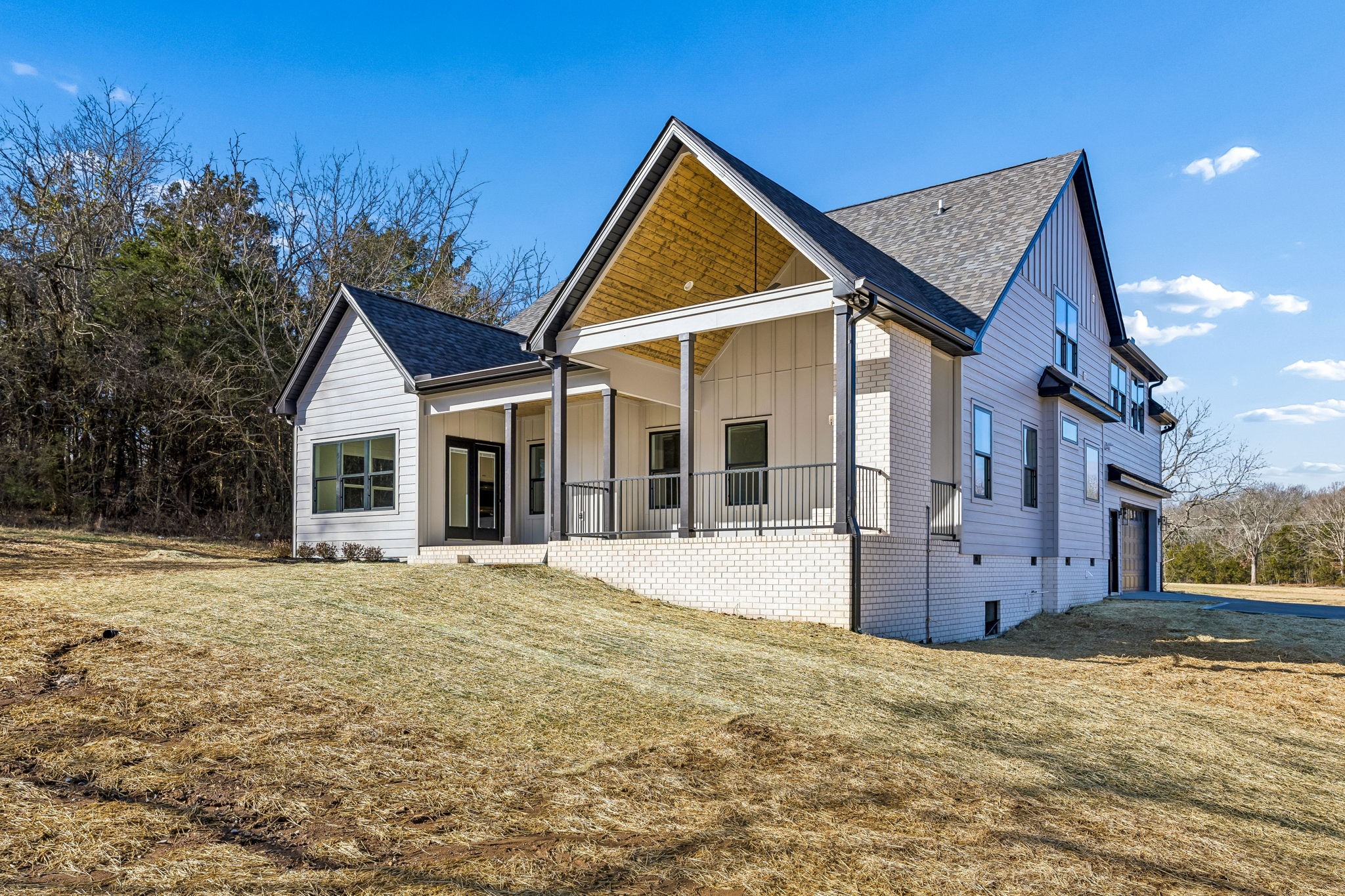 13841 Cainsville Road Lebanon, TN 37090 - Photo 63 of 81 a front view of a house with a yard and garage