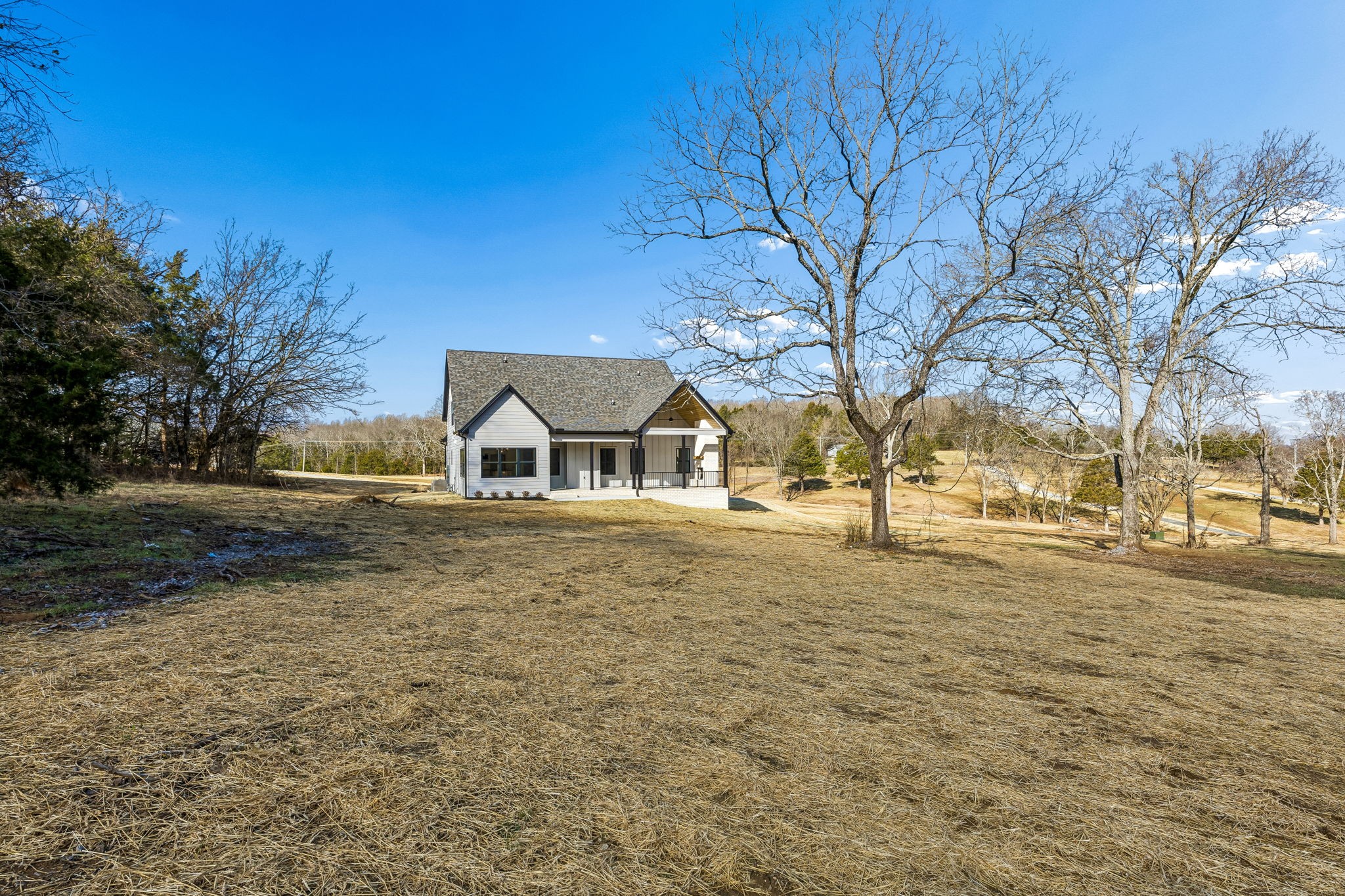13841 Cainsville Road Lebanon, TN 37090 - Photo 64 of 81 a house with trees in front of it