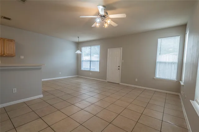 a view of an empty room with window