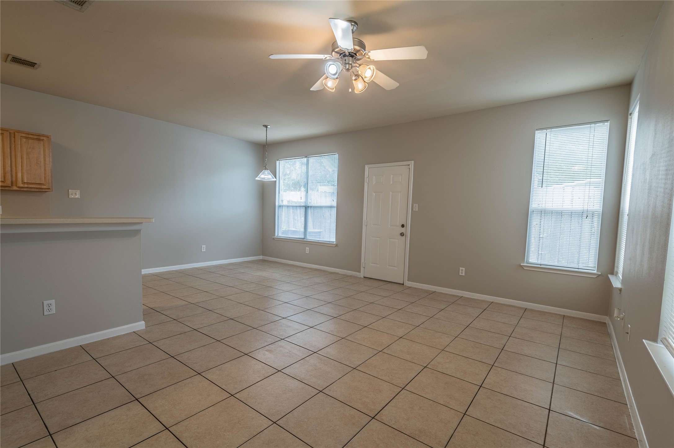11906 Chetman Drive, Unit A Houston, TX 77065 - Photo 3 of 15 a view of an empty room with window