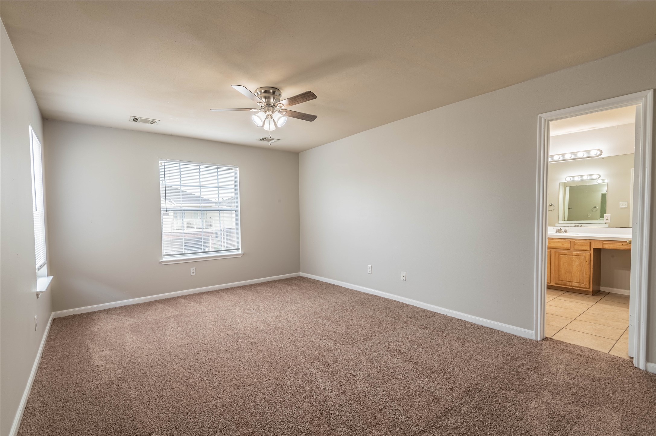 11906 Chetman Drive, Unit A Houston, TX 77065 - Photo 7 of 15 a view of an empty room with a window