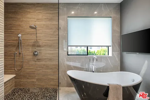 a bathroom with a sink and a bathtub