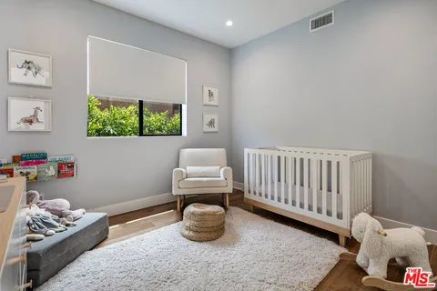 a room with furniture and a window