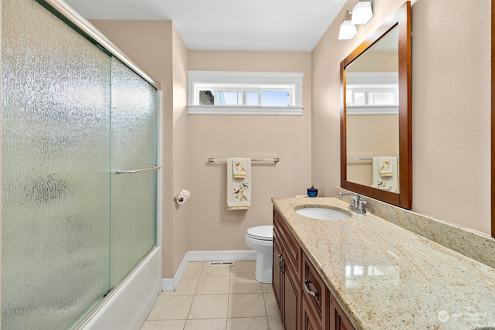 9604 South 236th Place Kent, WA 98031 - Photo 21 of 39 a spacious bathroom with a granite countertop sink a mirror and a shower